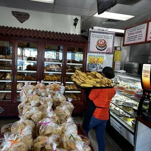a woman in a bakery