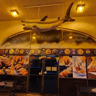 a plane flying over a restaurant
