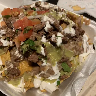 Stacked Nachos carne asada, it was STACKED btw