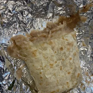 Split a big ol plain bean and cheese burrito...I used a little red sauce and yessir it was satisfying !!!