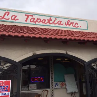 the entrance to a restaurant