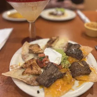 Half order of mixed nachos + a house margarita.