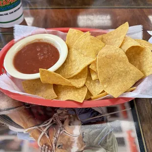 a plate of chips and salsa