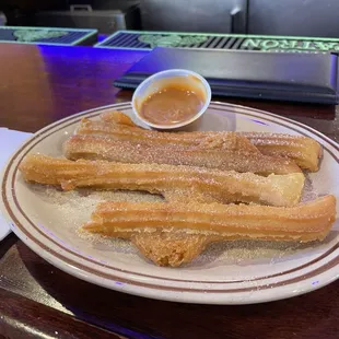 Churros with caramel dipping sauce