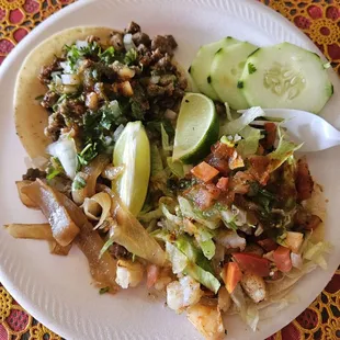 Carne asada taco and grilled shrimp taco