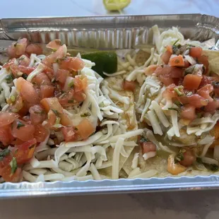 One shrimp and one chicken soft taco excellent