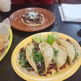 Chips and salsa, all 5 tacos on the menu, a sope, and 3 hot sauces