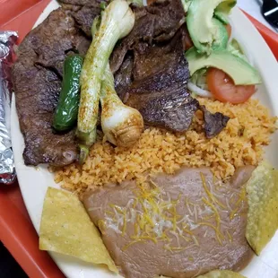 Carne asada. Notice that the plate is almost as big as the tray!