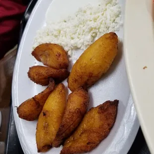 Plantains with crema and queso. Delicious.