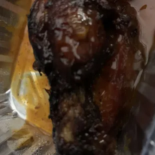 Burnt and hard to eat wings