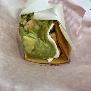 Crispy inside taco and outside soft taco, shrimp, onions, cilantro, avocado, sour cream and hot sauce is ridiculously tasty