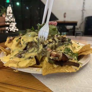 profile pic of the fully loaded nachos with pastor, delicioso !!