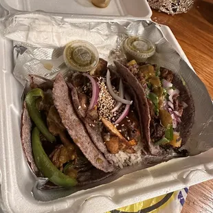 Left to right:  Steak taco Mole taco Barbacoa taco