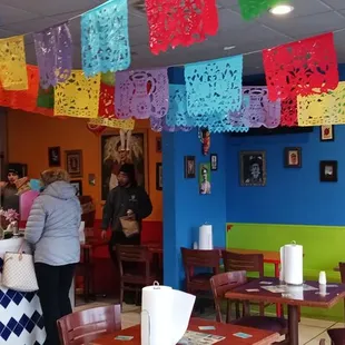 the interior of a mexican restaurant