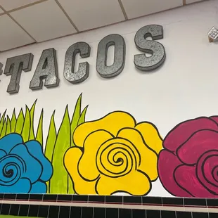 a mural of colorful flowers