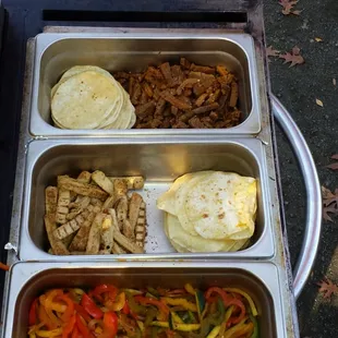 Vegeterian taquiza, fresh grilled vegetables, chicken less strips, chipotle flavor saitin.