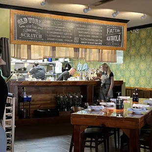 the blackboard showing the local farms - and the Amazing chef and bartender in action