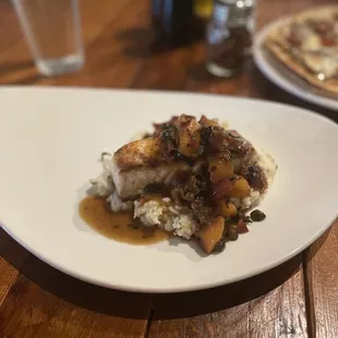 Halibut with some sort of mash.