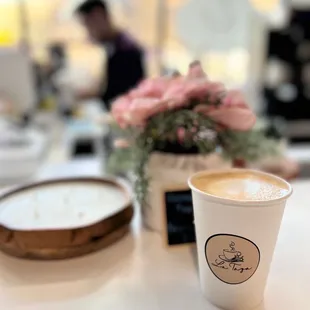 a cup of coffee on a table