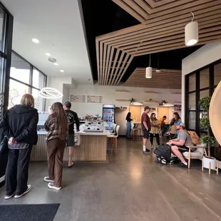 a group of people in a coffee shop