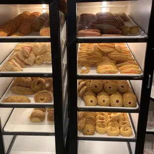 a display case full of pastries