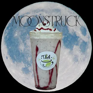 a milkshake in front of a full moon