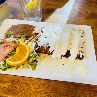 Enchiladas Rojas not the traditional enchiladas missing the potatoes and the carrots lacking flavor and please don't add the sour cream !