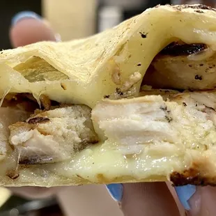 Lots of chicken and cheese in the quesadilla