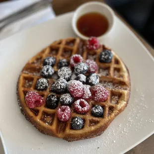 Mixed berry Waffle w/ 2 Fried Eggs and Bacon