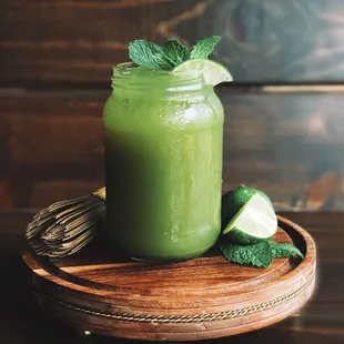 a green smoothie in a mason jar