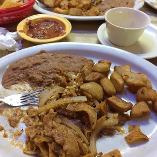 Chilaquiles Rojas!  Whew! An 8 of 10 on the slow heat scale!  And great!