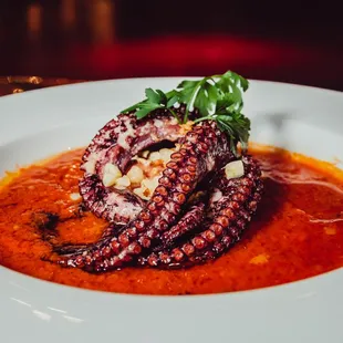 PULPO ENOJADO The angry octopus monthly special dish Cooked with our homemade spicy hot sauce served with white rice, grill vegetables