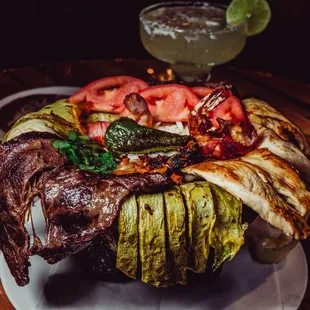 CIELO, MAR Y TIERRA the magnificent three: chicken, steak and shrimp  accompanied with two quesadillas grill cactus, and topped