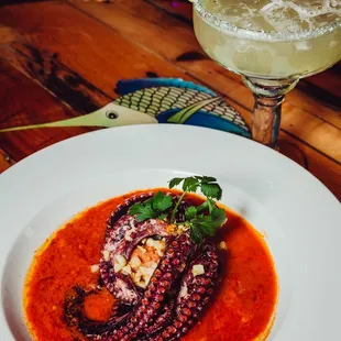 PULPO ENOJADO The angry octopus monthly special dish Cooked with our homemade spicy hot sauce served with white rice, grill vegetables