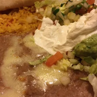 Rice, beans, Pico, cream that do with fajitas