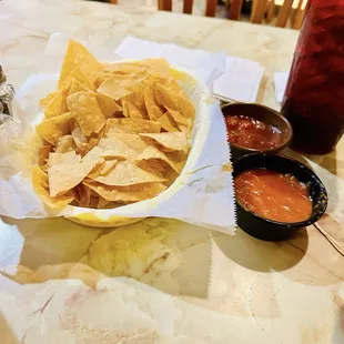 Homemade tortilla chips and two types of homemade salsa delicious!
