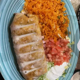 Chimichanga with beef tips and a side of rice