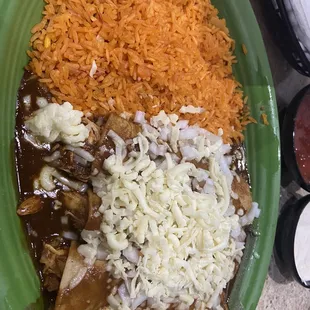 Enchiladas Poblanas-not good mole sauce and overcooked rice