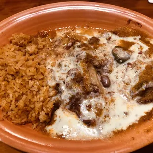 Rice, Chile Relleno, tamale with melted cheese