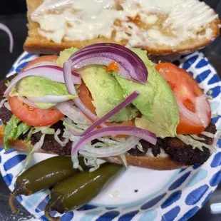 a plate with a sandwich on it