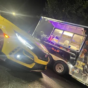 a food truck and a car