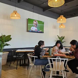 Open dining area with TV