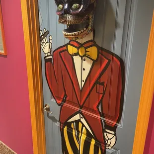 Men's room is clean and well decorated.