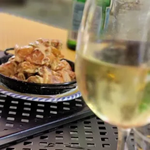 Bravas and a glass of Granache Blanc