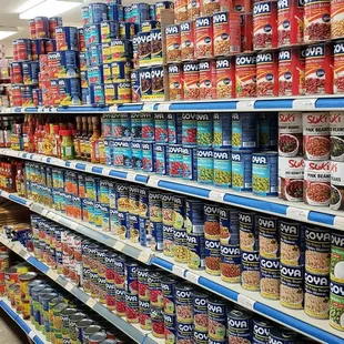 a grocery store aisle with canned food