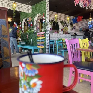 Tamarind juice in a special cup that keeps it nice and cold