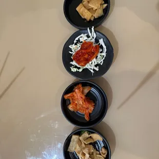 Starters: rice cake, kimchi, squid, radish