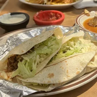 3 Soft Beef Tacos and chicken nachos (I think?)