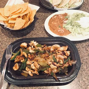 Chicken and shrimp fajitas