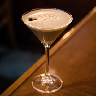 A perfectly crafted blend of premium vodka, freshly brewed espresso, and a hint of sweetness, garnished with a trio of coffee beans.